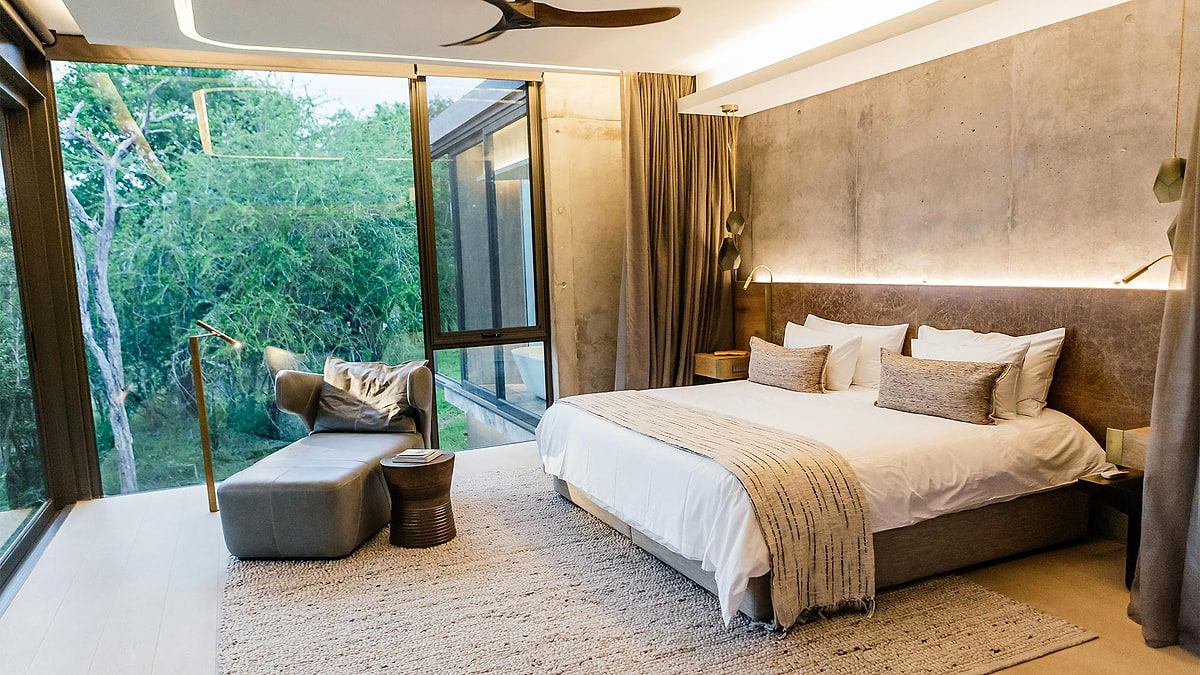 Calm suite with a window onto bushveld